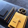 Schrijfblok Rhodia A5 lijn 80 vel 80gr met kantlijn oranje foto